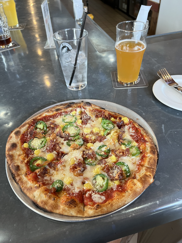 Mary&rsquo;s Bistro Hawaiian pizza and Austin Brothers Woody Wheat beer
