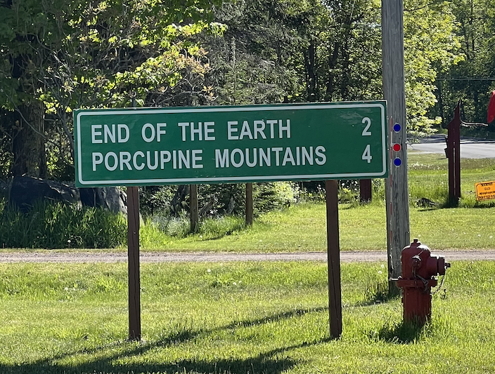 Sign that has End of the Earth