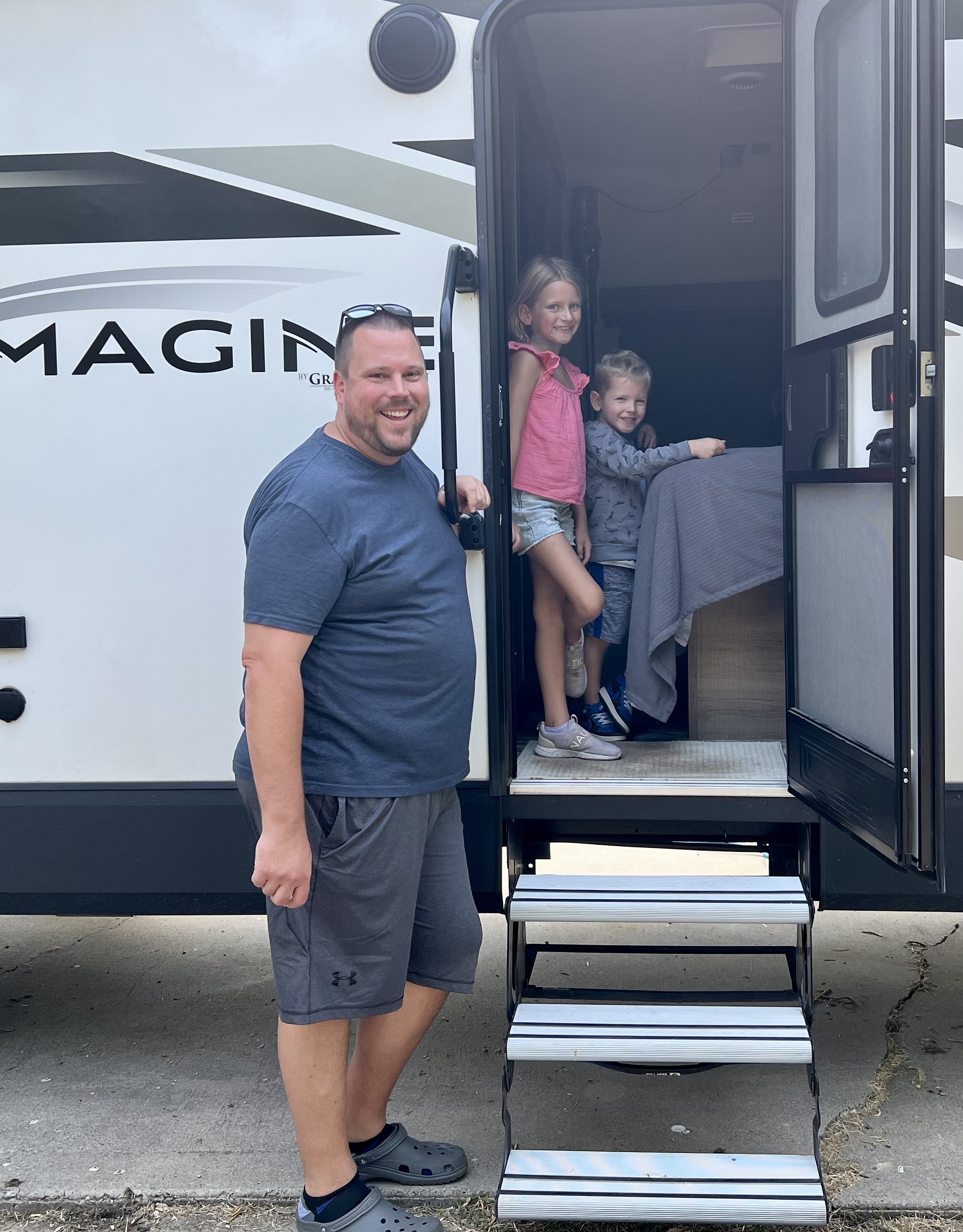 Two of my cousin&rsquo;s three kids inspecting the trailer