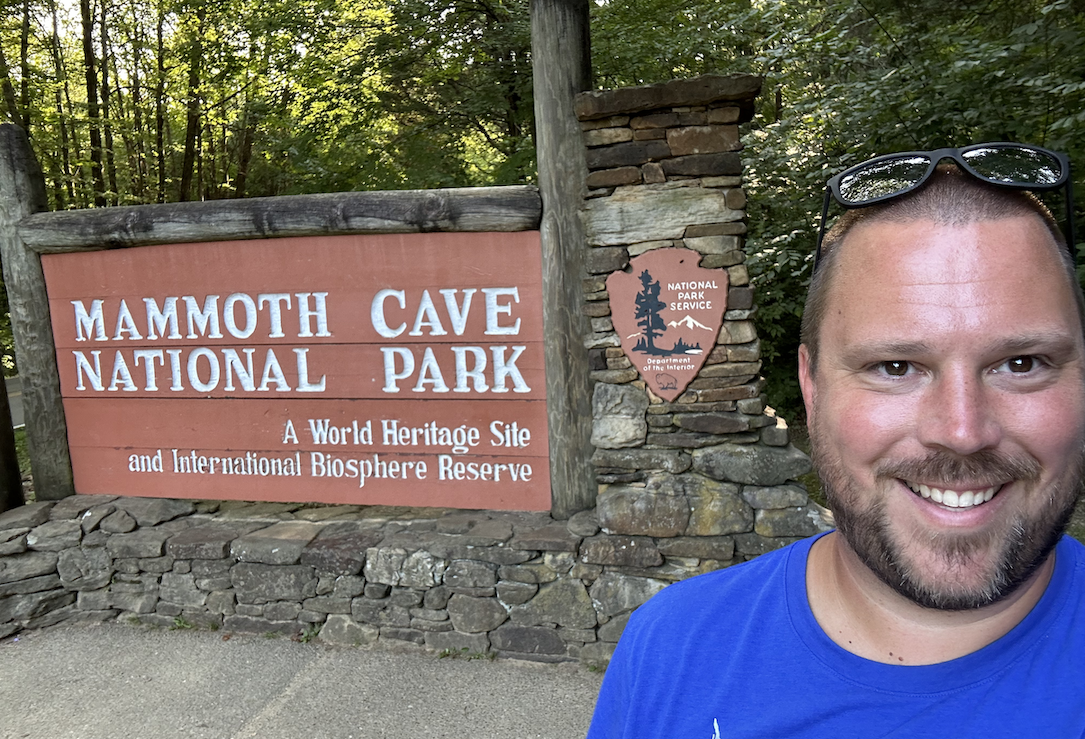 Me in front of the Mammoth Cave National Park sign