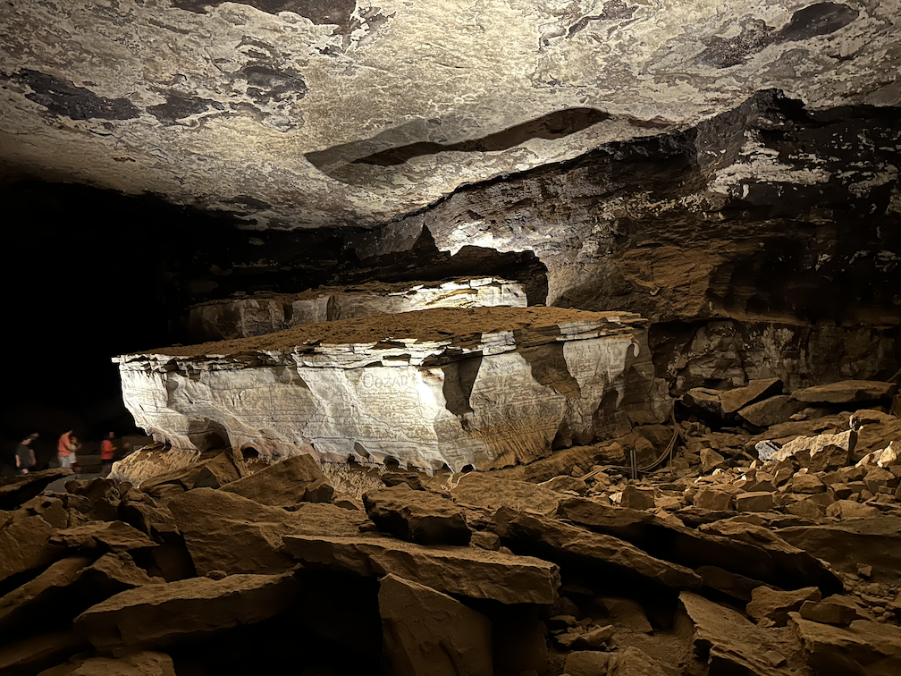 A large rock formation resembling a coffin