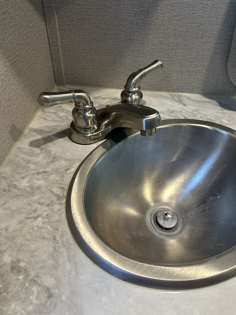 My old faucet that forced your hands to hit the sink