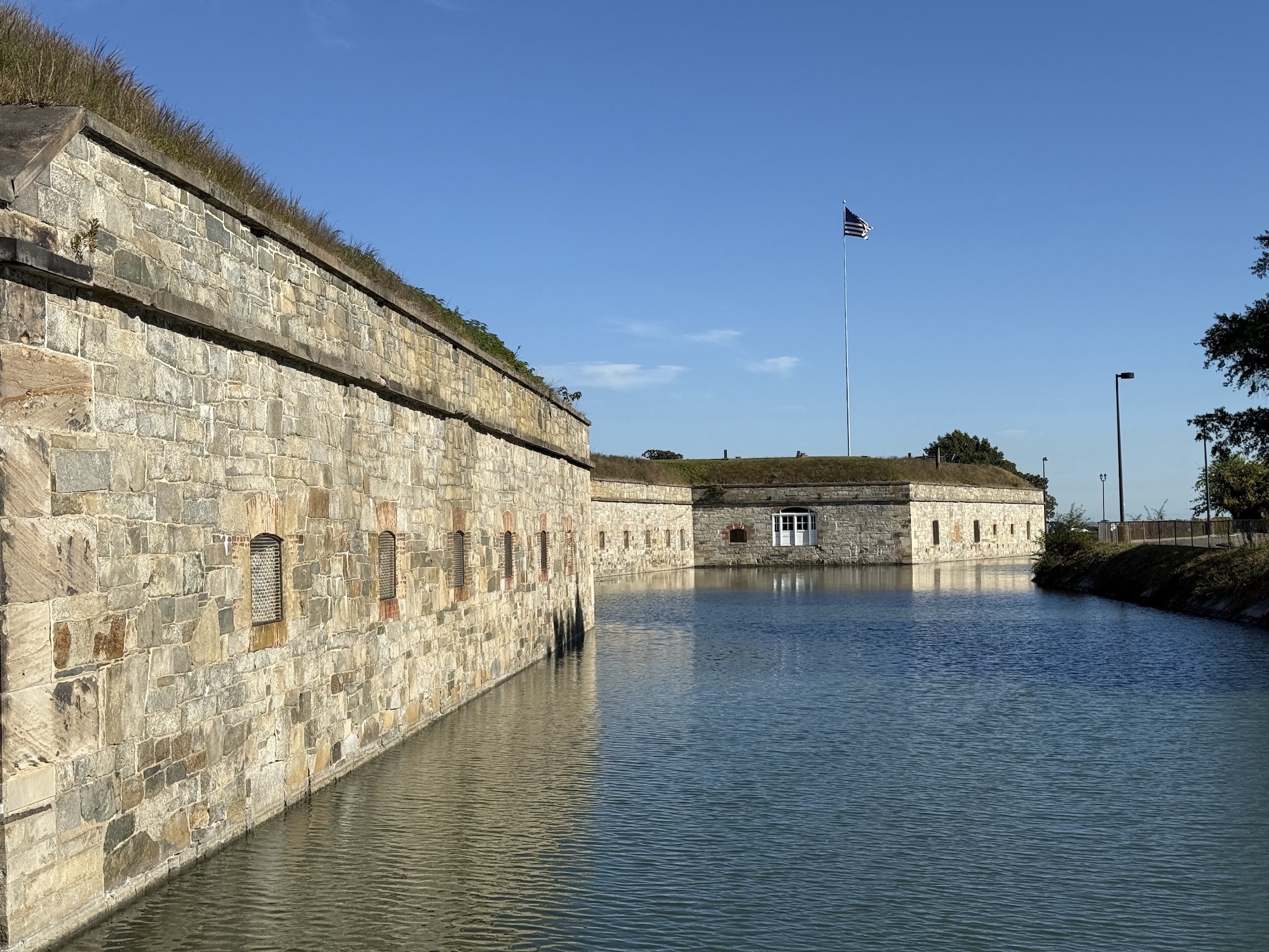 Photo of a wall and moat around Fort Monroe